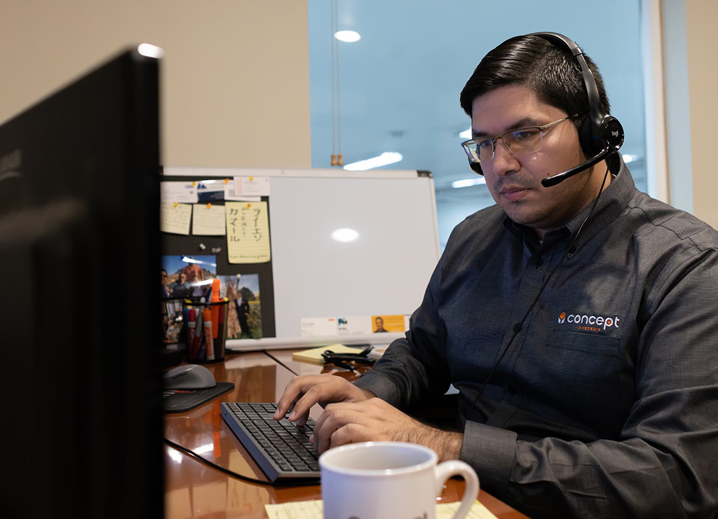 Man typing on a keyboard